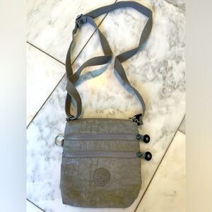 Kipling, gray adjustable strap multi-pocket mini crossbody purse